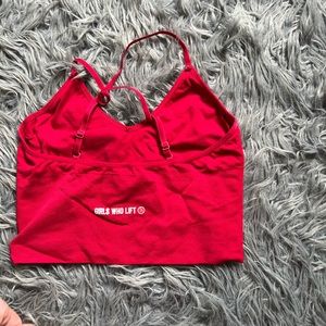 Girls who lift bra crop. Great condition. Size L. Pink/red. Removable pads.